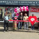 At the opening of the new Post Office on Heckmondwike in Dewsbury Moor, with Postmaster Ramya Athiyappan, centre, holding the big red heart and Mel Shepherd (PO Area Manager) cutting the ribbon.