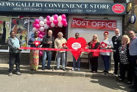 At the opening of the new Post Office on Heckmondwike in Dewsbury Moor, with Postmaster Ramya Athiyappan, centre, holding the big red heart and Mel Shepherd (PO Area Manager) cutting the ribbon.