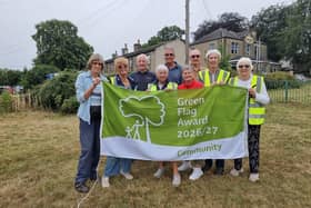 Members of Upper Hopton Community Association with their Green Flag.