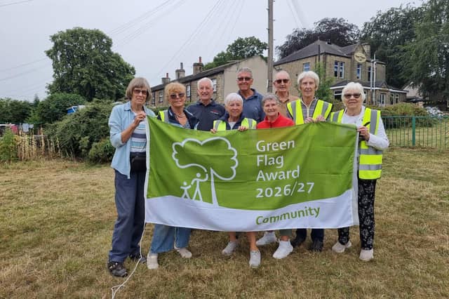 Members of Upper Hopton Community Association with their Green Flag.