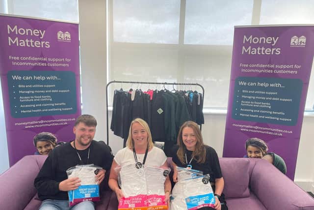 Money Matters team manager Emma Warden (centre) with Josh Reilly (l) and Nicky Hickey (r) from the team.
