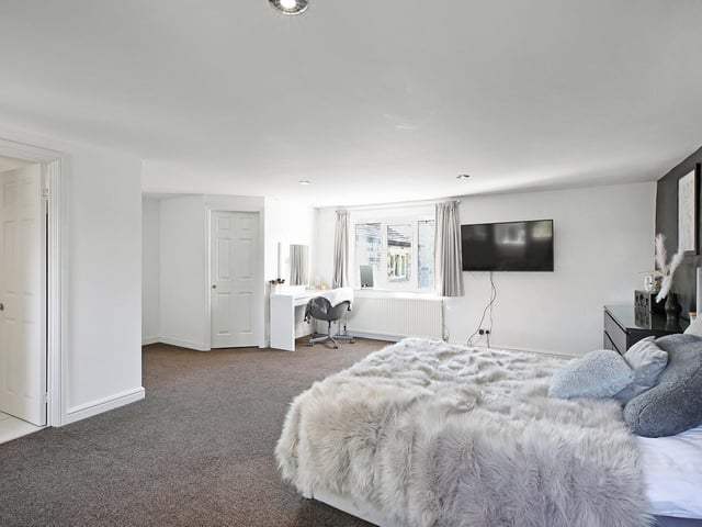 Another large bedroom, this one with study space.