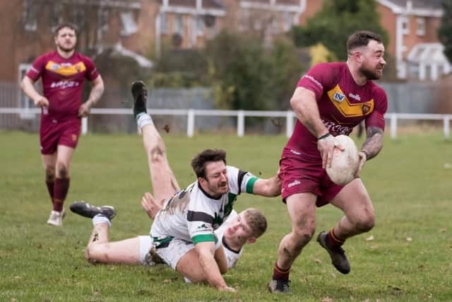 Ryan Crossley was at the heart of the action for Dewsbury Moor Maroons against Wigan St Judes. Picture: John Devine