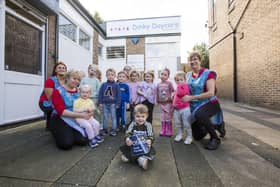 Dinky Daycare in Thornhill, Dewsbury, has received a 'good' Ofsted rating. Pictured: children, with staff, from the left, Lyndsey Brook, Brooke Shaw, Sammi Wolfenden and Dawn Colbeck.