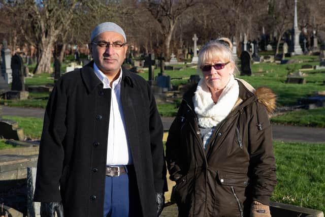 Mohammed Javed, chair of Dewsbury Cemetery Action Group, with Christine Leeman, at the town's cemetery