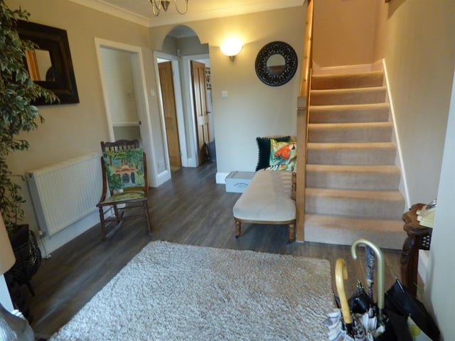 The entrance hallway leads through to the ground floor accommodation, with a staircase to the first floor landing.