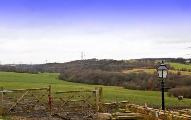 Fields stretch out to give extensive views from the semi rural property.