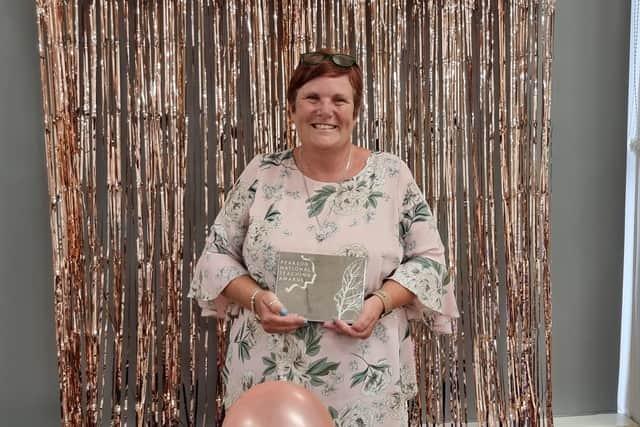 Mandy Farrar, safeguarding and wellbeing officer at Diamond Wood Community Academy, was presented with the Silver Award for Unsung Hero - from The Pearson National Teaching Awards - at a surprise ceremony at the Ravensthorpe school on Wednesday, June 21.