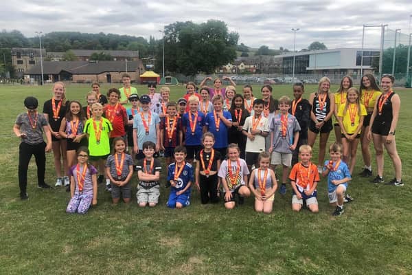 Youngsters who got to have a go at athletics at Spenborough AC's summer holiday event.