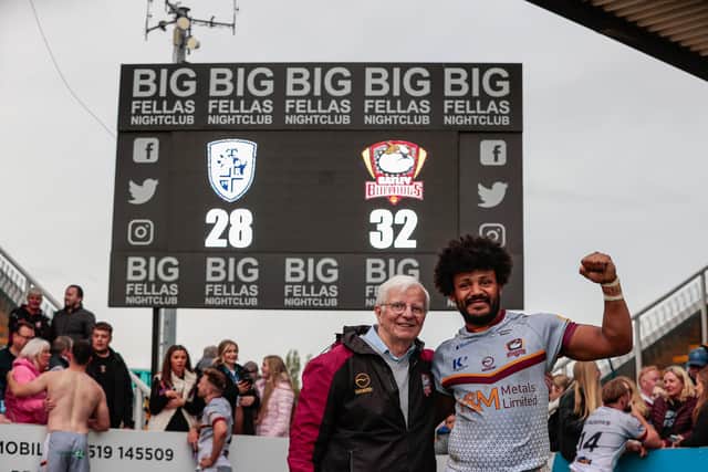 Batley's chaplain, Derek Ventress with Johnny Campbell after the Bulldogs' stunning 32-28 victory over Featherstone Rovers last weekend. The result has propelled them to the Million Pound Game at Leigh Centurions.