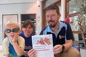 Four-year-old Alexander Dunn, from Dewsbury, presented with his Young Persons Certificate of Commendation from the Royal Life Saving Society UK (RLSS UK) by RLSS UK Mentor and Course Tutor Garry Hume and his swim teacher from Swimbabes Fiona Mellor.