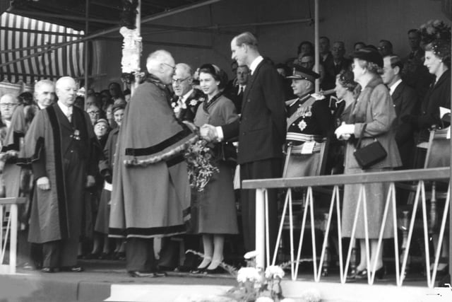 Queen Elizabeth II and Prince Philip, Duke of Edinburgh, on a visit to Dewsbury in October 1954.