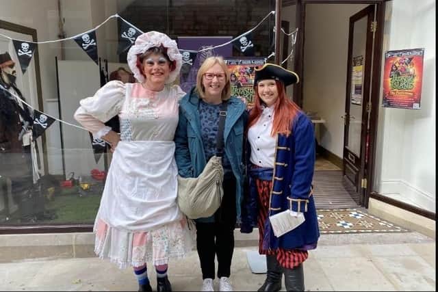 Cast members of Dewsbury Arts Group’s latest show - a panto version of Treasure Island - took to their very own one-off pop-up box office in the newly-refurbished Dewsbury Arcade where they sold tickets, chatted with members of the public and posed for photos.
