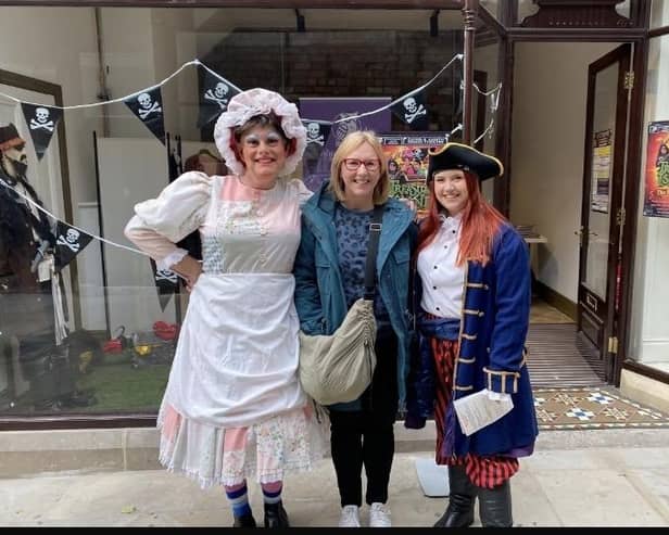 Cast members of Dewsbury Arts Group’s latest show - a panto version of Treasure Island - took to their very own one-off pop-up box office in the newly-refurbished Dewsbury Arcade where they sold tickets, chatted with members of the public and posed for photos.