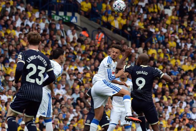 Ethan Ampadu gets up highest in a challenge for a high ball.