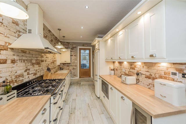 A modern and well equipped kitchen has underfloor heating.