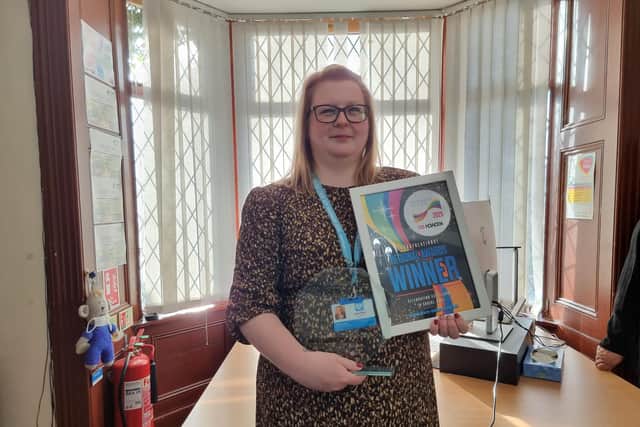 Becky Smith, who was born deaf, with her Yorkshire and Humberside Great British Care Award 2025.
