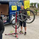 Dwid Matyjs and Amelia Di-Clemente, from The Bikes College in Leeds,  have been offering their services - which has already included 61 riders using a pump; six brake pads replacement; seven tubes to replace punctures; six chain links given away; four saddles tightened - for free.