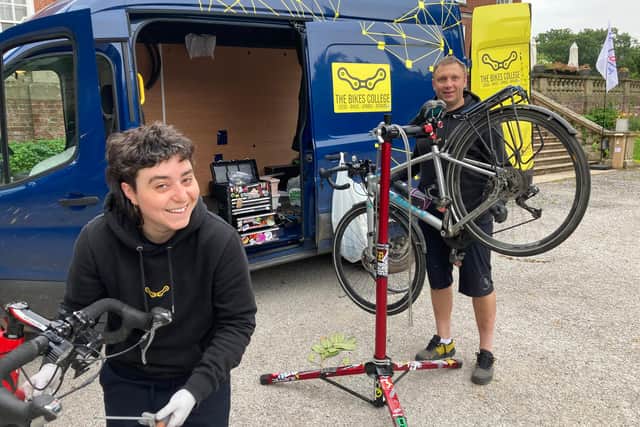 Dwid Matyjs and Amelia Di-Clemente, from The Bikes College in Leeds,  have been offering their services - which has already included 61 riders using a pump; six brake pads replacement; seven tubes to replace punctures; six chain links given away; four saddles tightened - for free.