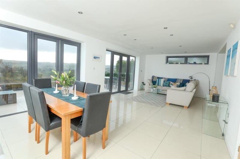 Open plan splendour with the dining and family areas that have access to the balcony terrace.