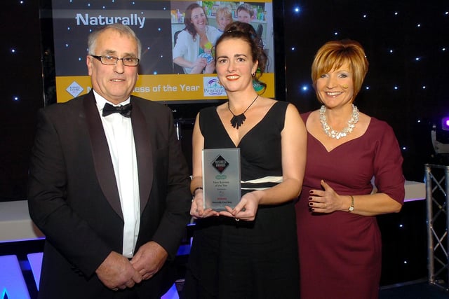 Mr Cook seen presenting the New Biz of the year award to Fiona Wood, owner and founder of Naturally Cool Kids, at the 2011 Reporter Series Business Awards at the Gomersal Park Hotel.