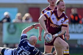 Josh Woods gets Batley Bulldogs attacking in their narrow defeat against Featherstone Rovers. Picture: Paul Butterfield