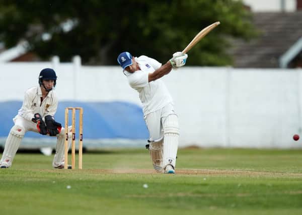 Imran Patel hits down the ground during Batleys Priestley Shield victory over Altofts last Sunday as they successfully chased down a total of 231 to secure a one-wicket win. Pictures: John Clifton