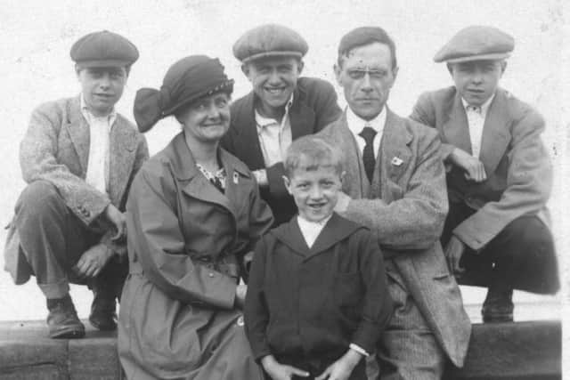 TV personality: Eddie Waring, pictured far left with his parents, who lived in Springfield, and other members of the family. They attended Springfield Congregational Church.