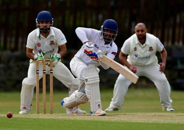 Aditya Waghmode on his way to 20 for Scholes as they defeated relegation rivals East Bierley.