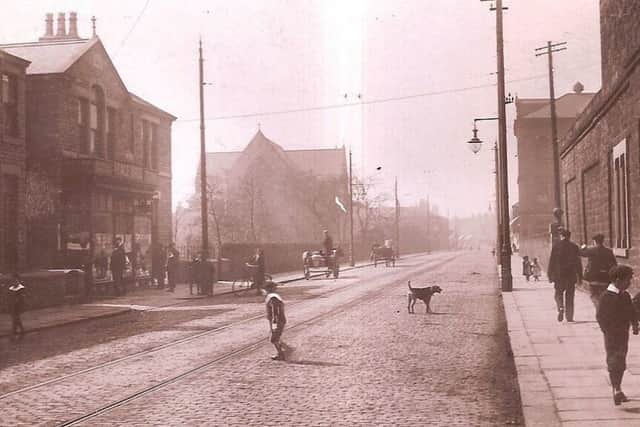 Shopping area: The picture shows Peaces Post Office on the left hand side, with St Saviours church in the distance. Further back from the post office is the outline of some houses, the end of which was an alleyway leading to Dewsbury Cooperative Society Joinery workshop where Harold served his apprenticeship as a joiner. On the right hand side is the front of the Gas Works and further on in the distance is Dewsbury Pioneers Cooperative Society.