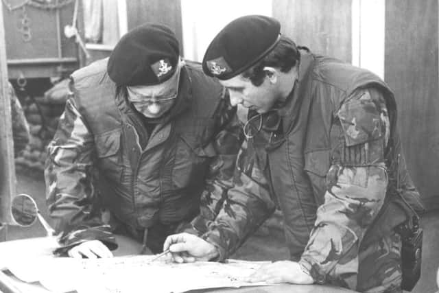Dukes company commander, Michael Bray, briefing the Colonel of the Dukes, General Sir Robert Bray, on operations in Northern Ireland in 1974.
