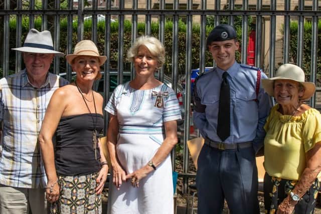 Dame Ingrid Roscoe with Cadet Warrant Officer Joe Jenkinson and his family.