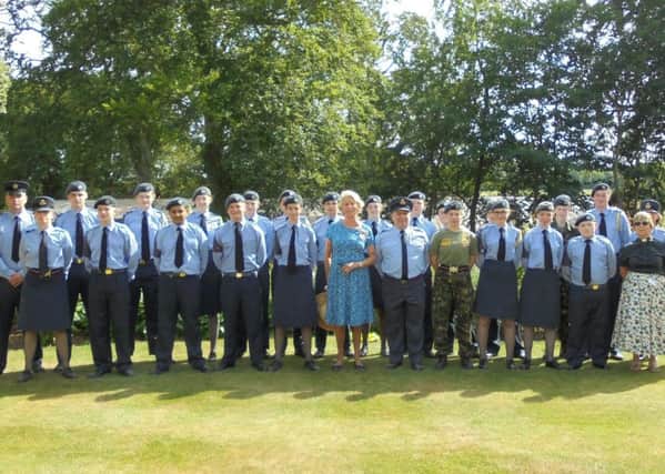 The air cadets contingent is pictured with Dame Ingrid Roscoe.