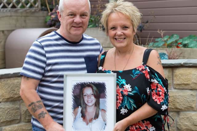 Steve and Bev Gough, with a picture of Naomi. They now run the charity, Naomi Cheri Gough Foundation