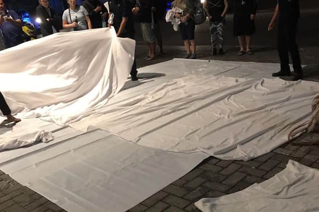 Hotel staff have joined locals in providing bedding for stranded tourists to sleep on.
