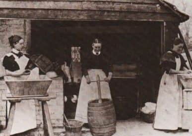 How we did the washing in the 19th century - a peggy tub. Note it takes three to do it.