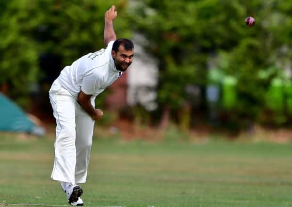 Batley bowler Huzaifah Patel sends down a delivery on his way to picking up 3-34 against Wrenthorpe in Bradford League Championship One on Saturday but it wasmt enough to prevent his side slipping to defeat. Pictures: Paul Butterfield.