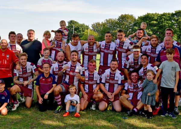 Thornhill Trojans celebrate clinching promotion to the National Conference Premier Division following their 28-6 victory over Lock Lane in front of the television cameras last Saturday. Pictures: Paul Butterfield