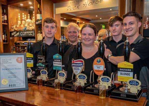 RAISING THE BAR: The New Packhorse in Cleckheaton scooped the pub of the season award from the Heavy Woollen CAMRA branch.