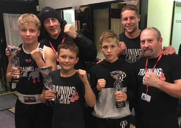 Training Cave fighters Brandon Brearley, Noah Nicholls and Freddie Phillips with their coaches.