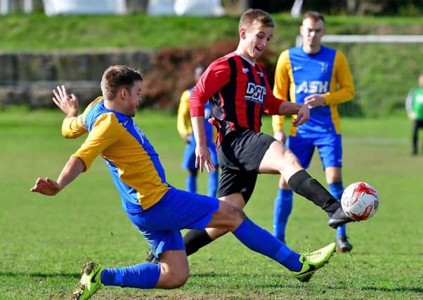 Victory saw Hopton move above Littletown, who were not in action during last Sundays Heavy Woollen Premier Division game. Pictures: Paul Butterfield.