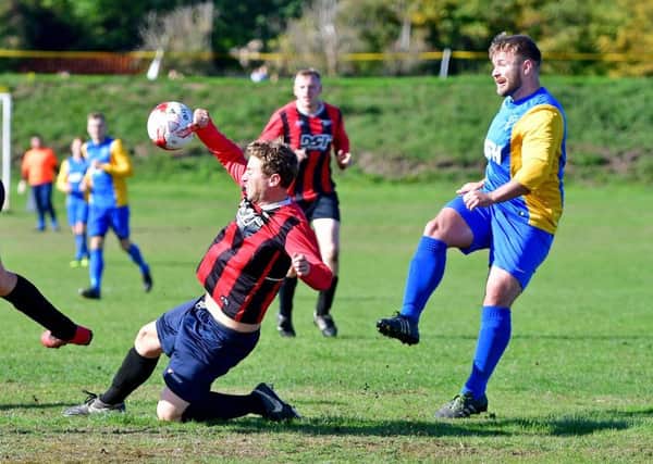Kieran Corley scored twice as Mirfield Town beat Navigation 4-3 in the HW Sunday League Premierr Division.