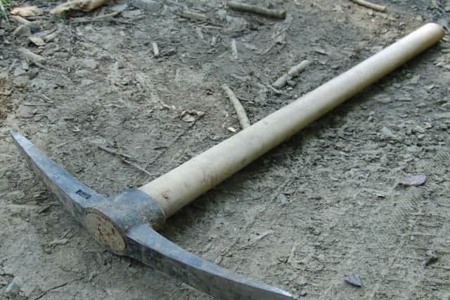 The attackers used a pick-axe in the robbery.