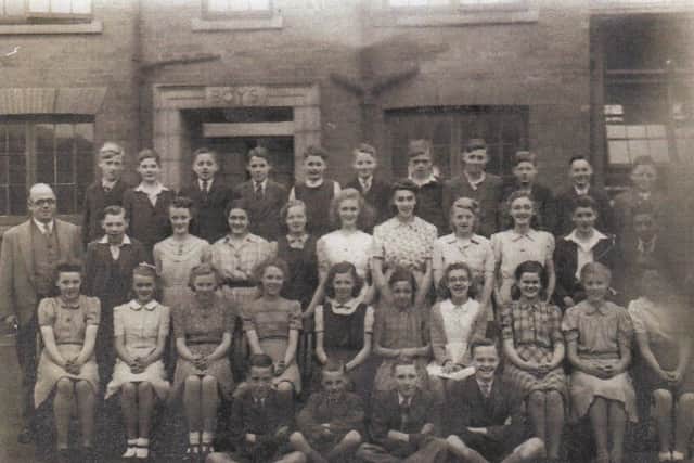School Days: Pupils at Ravensthorpe Senior School. Harold Laycock attended Ravensthorpe before going to Dewsbury Technical School. He is pictured fourth from the left standing on the back row. The teacher is Mr Gledhill, known as Joe Gledhill.