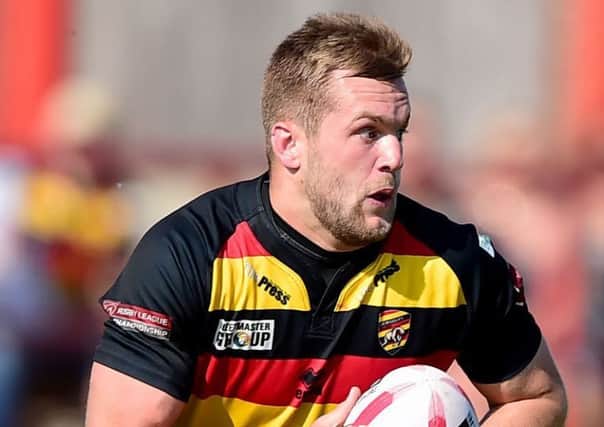 Robbie Ward has penned a new deal to remain at Dewsbury Rams for the 2019 season after helping the cloub retain their Championship status.