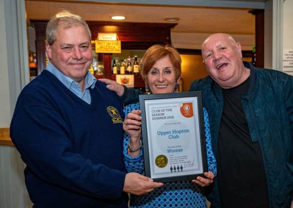 Certificate: CAMRA chairman Andy Kassube presents the Summer Club award to Gail Auty and Rob Ellis at the Upper Hopton Club.