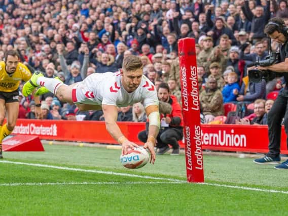 England's Tommy Makinson dives in for his first try (SWPix)