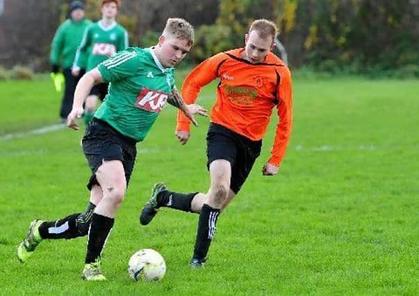Shane Thornton (right) netted in Howden Cloughs 5-2 win away to Thornhill United last Saturday.