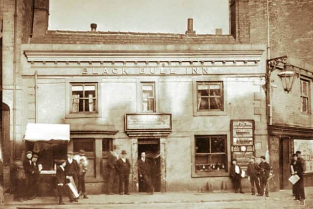 One of many, many pubs in Dewsbury: The Old Black Bull in Market Place before it was altered in the 1920s.