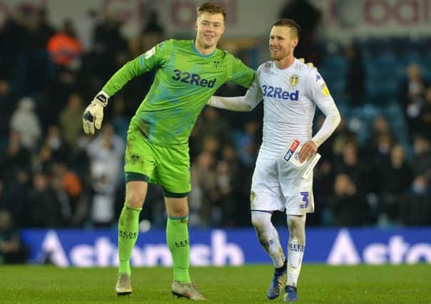 Bailey Peacock-Farrell and Barry Douglas show their delight at the end of Leeds United's win over Reading. Picture: Bruce Rollinson